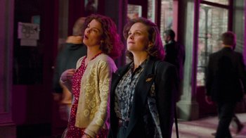 Movie still from “The Firm” (1993), directed by Sydney Pollack – Two women standing next to each other on a sidewalk; Medium shot, Low angle