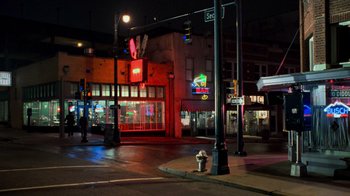 Movie still from “The Firm” (1993), directed by Sydney Pollack – A fire hydrant on the side of the road at night; Extreme Wide shot, High angle