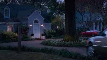 Movie still from “The Firm” (1993), directed by Sydney Pollack – A house that is in the middle of the night; Extreme Wide shot, High angle