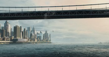 Movie still from “The Flash” (2023), directed by Andy Muschietti – A view of a city from a boat on the water; Extreme Wide shot, High angle