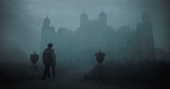 Movie still from “The Flash” (2023), directed by Andy Muschietti – A man standing in front of a castle in the fog; Extreme Wide shot, Low angle