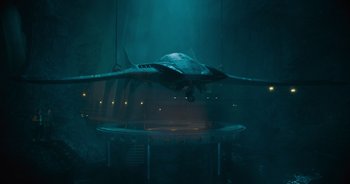 Movie still from “The Flash” (2023), directed by Andy Muschietti – An airplane flying through the air at night; Extreme Wide shot, High angle