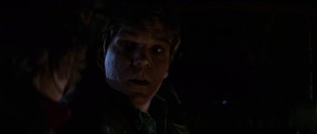 Movie still from “The Fog” (1980), directed by John Carpenter – A young man is looking into the camera; Close Up shot, Low angle