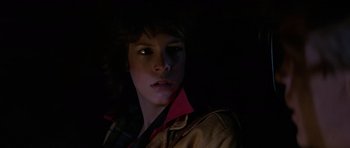 Movie still from “The Fog” (1980), directed by John Carpenter – A person with a jacket on in the dark; Close Up shot, Low angle