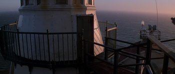 Movie still from “The Fog” (1980), directed by John Carpenter – A view of the ocean from the stairs leading to a lighthouse; Extreme Wide shot, Low angle