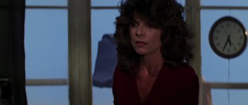 Movie still from “The Fog” (1980), directed by John Carpenter – A person wearing a red shirt; Close Up shot, Low angle