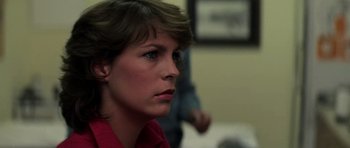 Movie still from “The Fog” (1980), directed by John Carpenter – A person with short brown hair; Close Up shot, Low angle