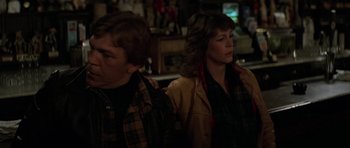 Movie still from “The Fog” (1980), directed by John Carpenter – A man and a woman standing next to each other; Medium shot, Over the shoulder angle