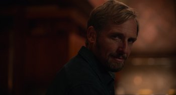 Movie still from “The Forever Purge” (2021), directed by Everardo Gout – A person wearing a shirt; Close Up shot, Over the shoulder angle