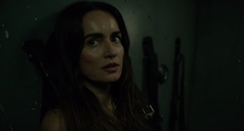 Movie still from “The Forever Purge” (2021), directed by Everardo Gout – A person with long hair; Close Up shot, Over the shoulder angle