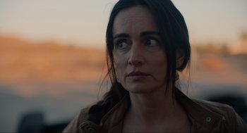 Movie still from “The Forever Purge” (2021), directed by Everardo Gout – A person looking at the camera; Close Up shot, Over the shoulder angle