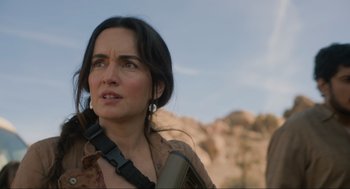 Movie still from “The Forever Purge” (2021), directed by Everardo Gout – A person with a gun; Close Up shot, Over the shoulder angle