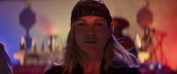 Movie still from “The Forgiven” (2021), directed by John Michael McDonagh – A person wearing a hat; Close Up shot, Low angle