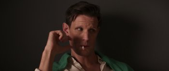 Movie still from “The Forgiven” (2021), directed by John Michael McDonagh – A man with a cigarette in his mouth; Close Up shot, High angle