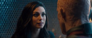 Movie still from “Deadpool 2” (2018), directed by David Leitch – A person talking to another person; Close Up shot, Over the shoulder angle