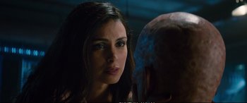 Movie still from “Deadpool 2” (2018), directed by David Leitch – A person looking at the camera; Close Up shot, Over the shoulder angle