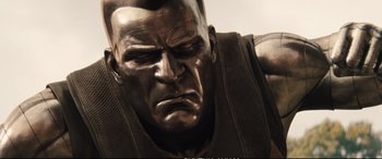 Movie still from “Deadpool 2” (2018), directed by David Leitch – A statue of a man's face; Close Up shot, Low angle