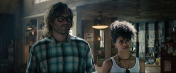 Movie still from “Deadpool 2” (2018), directed by David Leitch – A man and a woman standing next to each other in a room; Medium shot, Low angle