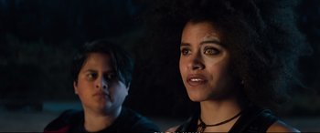 Movie still from “Deadpool 2” (2018), directed by David Leitch – Two people are looking at the camera in the dark; Close Up shot, Over the shoulder angle