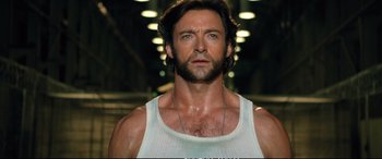 Movie still from “Deadpool 2” (2018), directed by David Leitch – A person wearing a tank top; Close Up shot, Low angle