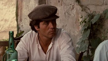 Movie still from “The Godfather” (1972), directed by Francis Ford Coppola – A person wearing a hat; Close Up shot, Low angle