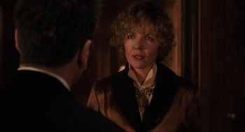 Movie still from “The Godfather Part III” (1990), directed by Francis Ford Coppola – A man and a woman are talking to each other in front of a mirror; Close Up shot, Over the shoulder angle