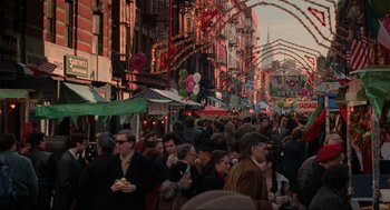 Movie still from “The Godfather Part III” (1990), directed by Francis Ford Coppola – A crowd of people walking down a street; Extreme Wide shot, High angle
