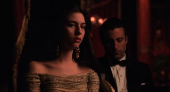 Movie still from “The Godfather Part III” (1990), directed by Francis Ford Coppola – A man and a woman in evening attire; Close Up shot, Over the shoulder angle