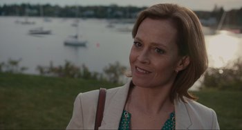 Movie still from “The Good House” (2021), directed by Maya Forbes – A person wearing a jacket; Close Up shot, Over the shoulder angle