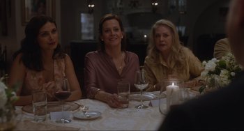 Movie still from “The Good House” (2021), directed by Maya Forbes – A group of women sitting at a table with wine glasses; Medium shot, Over the shoulder angle