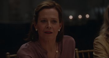 Movie still from “The Good House” (2021), directed by Maya Forbes – A person sitting in front of a mirror; Close Up shot, Over the shoulder angle
