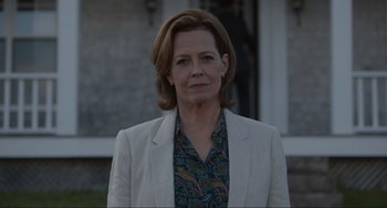 Movie still from “The Good House” (2021), directed by Maya Forbes – A person wearing a jacket; Medium shot, Over the shoulder angle