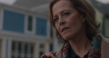 Movie still from “The Good House” (2021), directed by Maya Forbes – A person wearing a scarf; Close Up shot, Over the shoulder angle