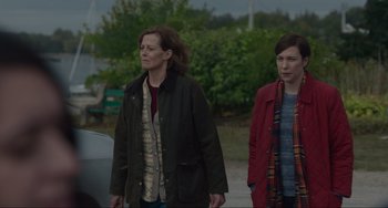 Movie still from “The Good House” (2021), directed by Maya Forbes – Two women walking down a street in a park; Medium shot, Over the shoulder angle