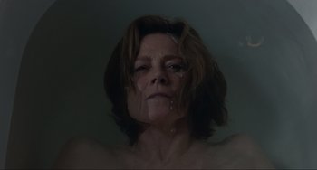 Movie still from “The Good House” (2021), directed by Maya Forbes – A person in a bath tub; Close Up shot, Overhead angle