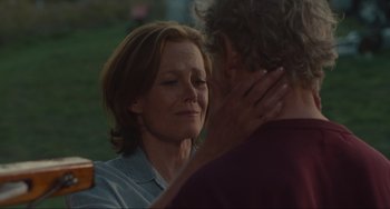 Movie still from “The Good House” (2021), directed by Maya Forbes – A person with their hand on his shoulder; Close Up shot, Over the shoulder angle
