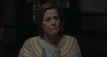 Movie still from “The Good House” (2021), directed by Maya Forbes – A person wearing a sweater; Close Up shot, Over the shoulder angle