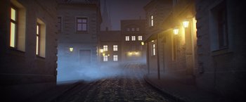 Movie still from “The Good Neighbor” (2022), directed by Stephan Rick – An empty street at night with lights on; Extreme Wide shot, High angle