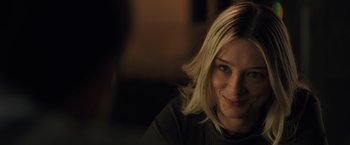 Movie still from “The Good Neighbor” (2022), directed by Stephan Rick – A person with blonde hair; Close Up shot, Over the shoulder angle
