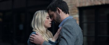 Movie still from “The Good Neighbor” (2022), directed by Stephan Rick – A man and a woman are kissing in the street; Close Up shot, Over the shoulder angle