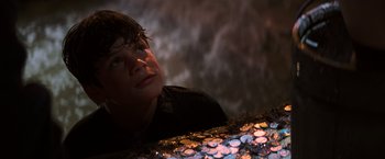 Movie still from “The Goonies” (1985), directed by Richard Donner – A young boy is looking up at the sky; Close Up shot, Low angle