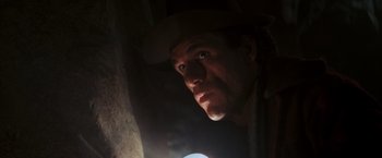 Movie still from “The Goonies” (1985), directed by Richard Donner – A person wearing a cowboy hat; Close Up shot, Low angle