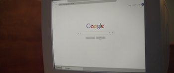 Movie still from “The Great Seduction” (2023), directed by Celso R. García – A computer screen showing a google search page; Extreme Close Up shot, High angle