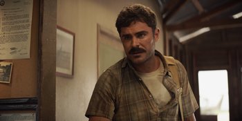 Movie still from “The Greatest Beer Run Ever” (2022), directed by Peter Farrelly – A person with a beard and mustache; Close Up shot, Over the shoulder angle