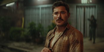 Movie still from “The Greatest Beer Run Ever” (2022), directed by Peter Farrelly – A person with a mustache; Close Up shot, Over the shoulder angle