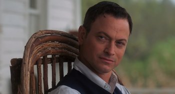 Movie still from “The Green Mile” (1999), directed by Frank Darabont – A person sitting in a chair; Close Up shot, Low angle
