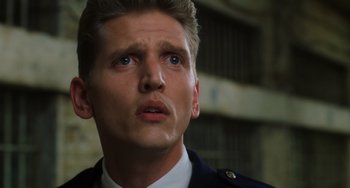 Movie still from “The Green Mile” (1999), directed by Frank Darabont – A person wearing a uniform; Close Up shot, Low angle