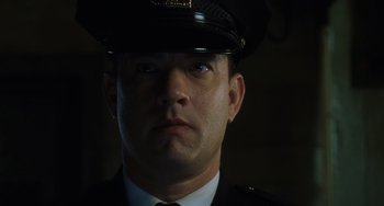Movie still from “The Green Mile” (1999), directed by Frank Darabont – A person wearing a uniform; Close Up shot, Low angle