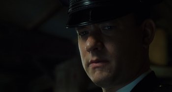 Movie still from “The Green Mile” (1999), directed by Frank Darabont – A person wearing a hat; Close Up shot, Low angle