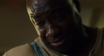 Movie still from “The Green Mile” (1999), directed by Frank Darabont – A person with a tear in his eye; Extreme Close Up shot, Low angle